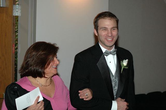 Susan Vallejo ushered by Jon Grubbs