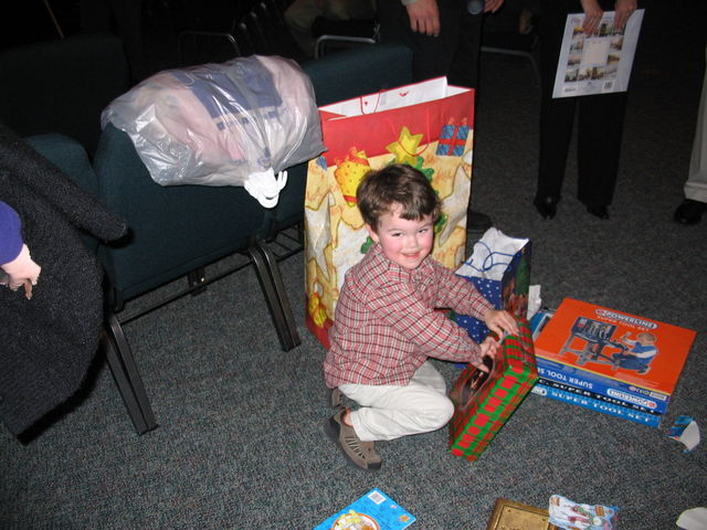 Owen Graham (Jen's nephew) - catching up on the Christmas presents from Georgia